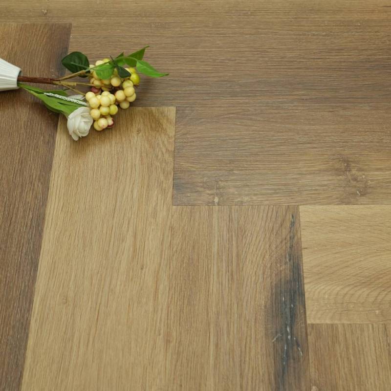 Panele winylowe SPC ze zintegrowanym podkładem Jodełka Del